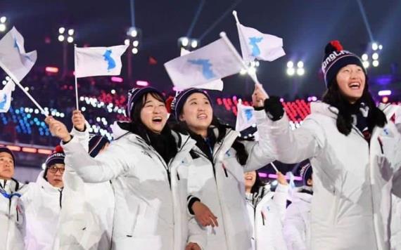 Las dos Coreas desfilan bajo una misma bandera