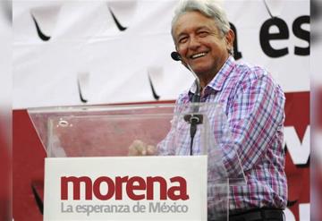 Seguidores de Morena forman las iniciales de AMLO en frontera con EU