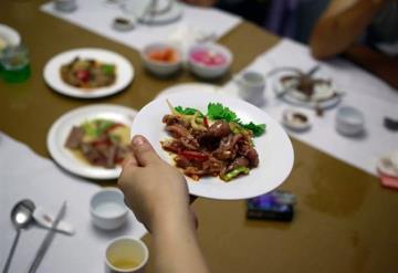 Solución en Norcorea para el calor: Comer carne de perro