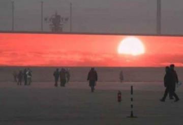 China emite en pantallas el amanecer en medio de la contaminación