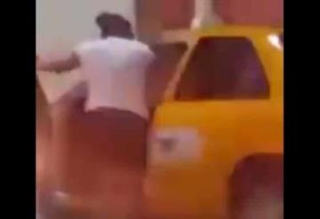 Tras discusión mujer es arrastrada por un taxista en calles de Villahermosa