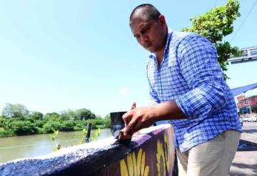 Realizan los últimos detalles del mural en el malecón Carlos A. Madrazo