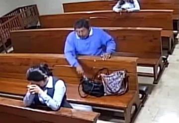 ¡Al estilo de paraiseño! Hombre roba celular en capilla y al salir todavía se persigna