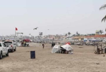 Desafían aislamiento y se van a la playa