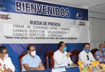 Firma de convenio entre Canaco Servytur y Canapat:  Modelo de prepago del programa Ahorrobus