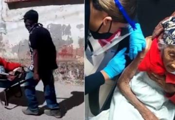 Vídeo: Hombre de 70 años lleva a su madre en carretilla para que reciba la vacuna contra el  COVID