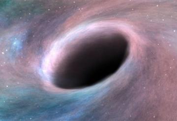 Descubren agujero negro supermasivo en galaxia vecina