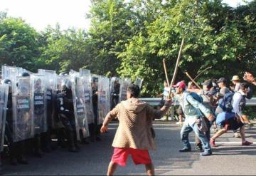 Caravana migrante se enfrenta contra Guardia Nacional en Chiapas