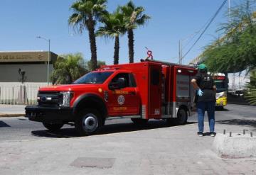 Policia rescata a mujer y niñas de voraz incendio en Torreón