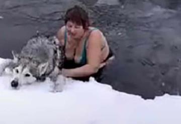 Mujer salta a río congelado para rescatar a un perrito