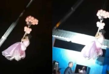 Quinceañera hace entrada triunfal a su fiesta descendiendo de una grúa