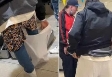 Por no querer pagar equipaje extra en aeropuerto joven se pone toda la ropa para poder viajar