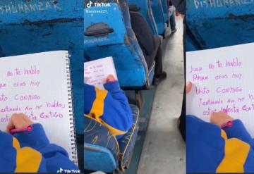 Niña escribe carta de desamor en transporte público