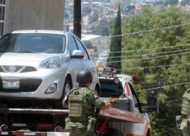 Caen 4 sujetos portando armas y uniforme militar en Querétaro