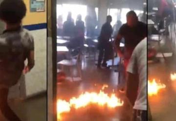 Captan a estudiante de 12 años prender fuego a su salón de clases en Brasil