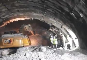 Obreros quedan atrapados en túnel por derrumbe