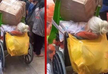 Video: Agarran de cargadora a abuelita con todo y silla de ruedas